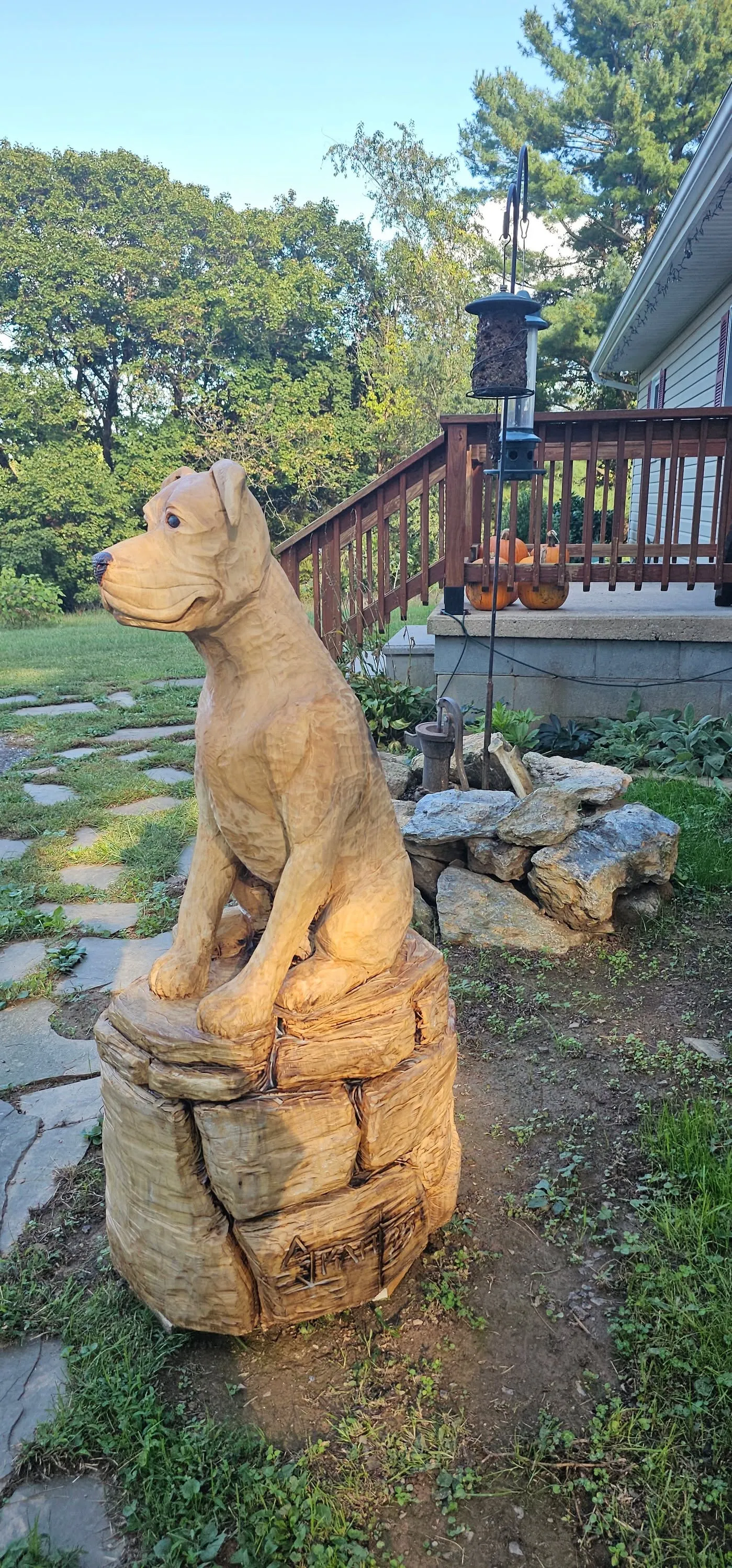 Sitting Dog On Carved Stone Base