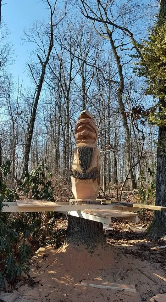 Standing Figure On A Stump
